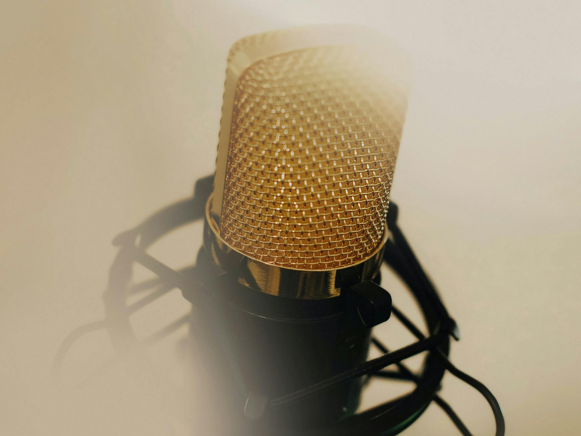 Microphone emerging from yellow fog