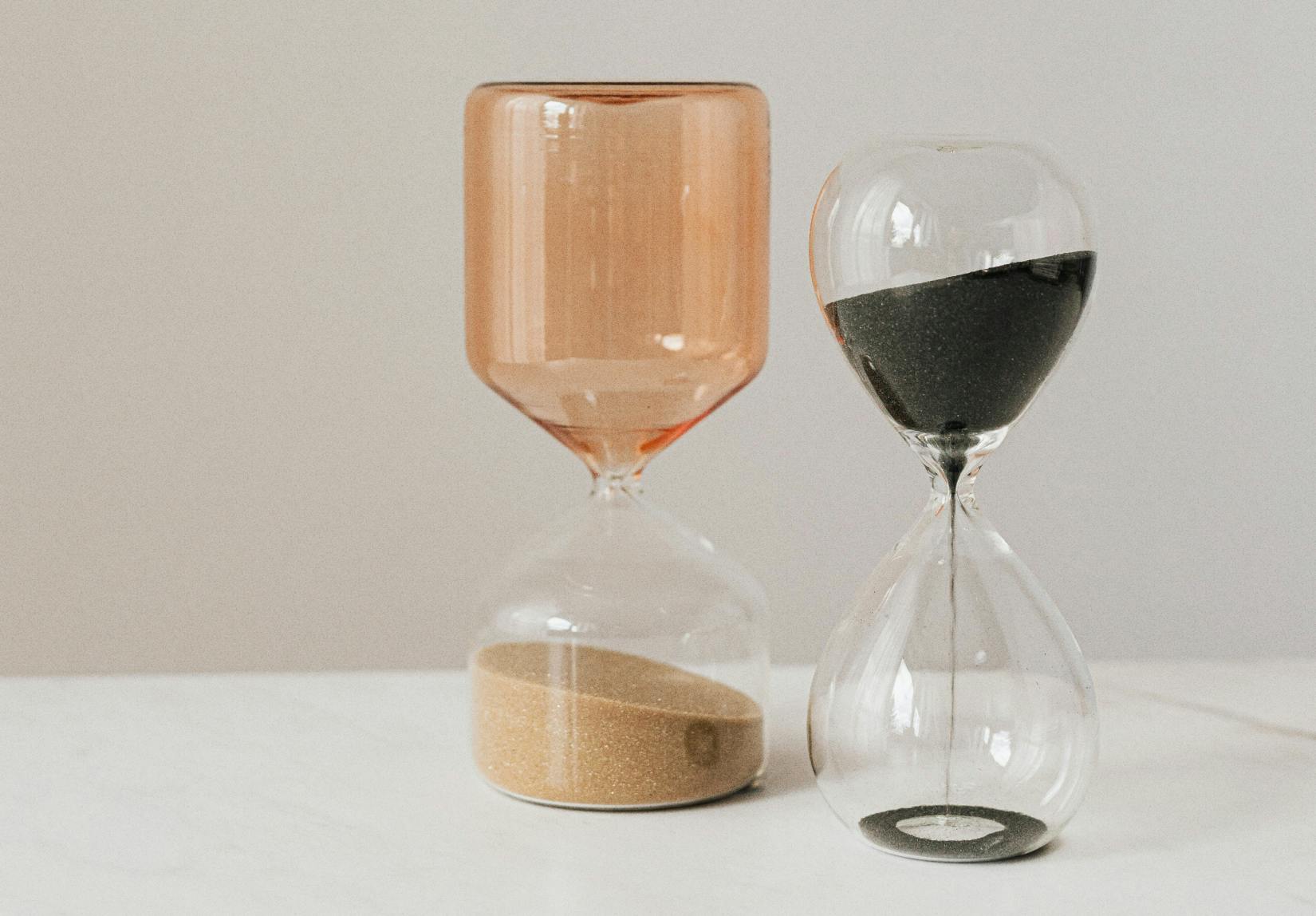 Set of Modern Hourglasses on Table