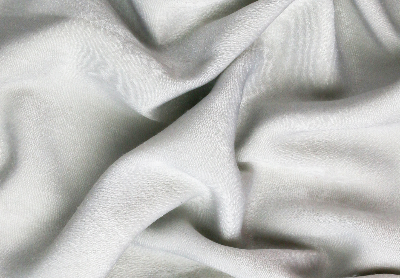 Rumpled white sheets